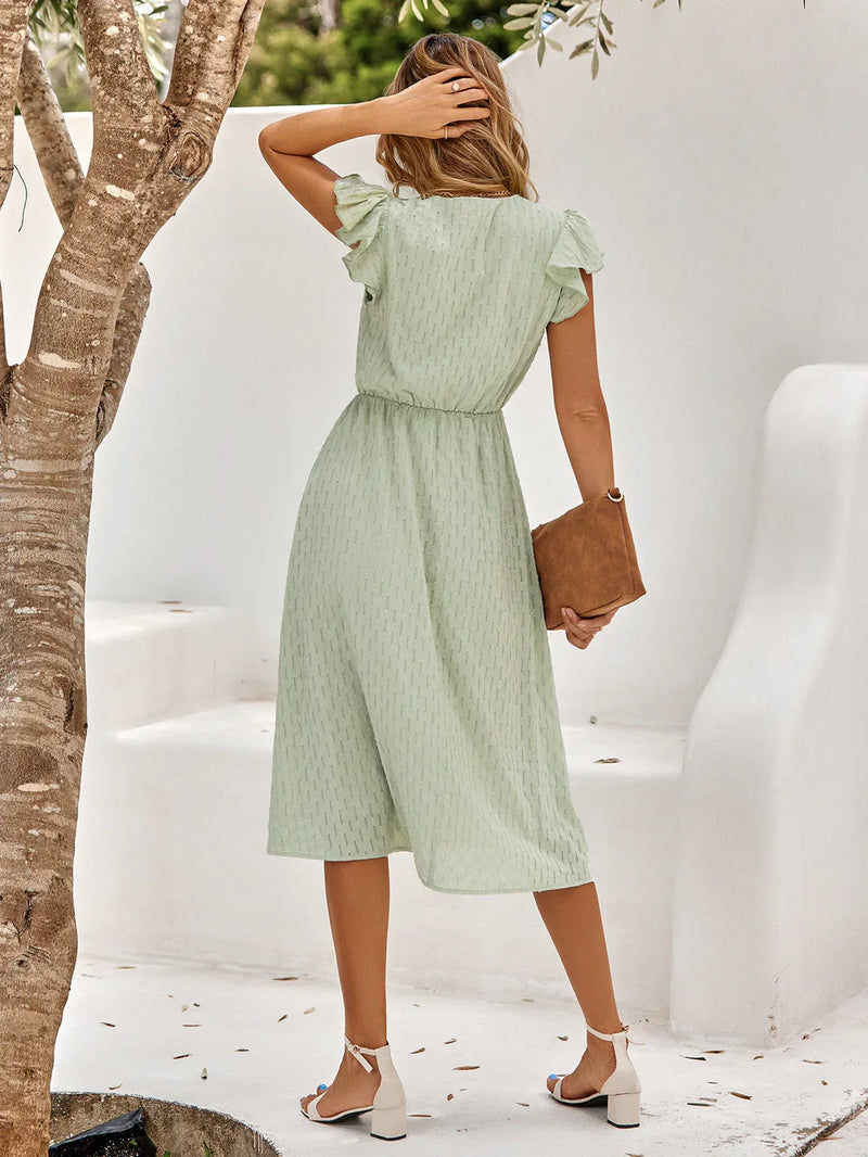 Ella Elegantes Baumwollkleid mit schwingenden Ärmeln