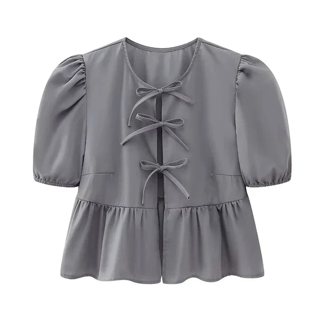 Bluse mit Leopardenmuster, Puffärmel und Schleifenakzent