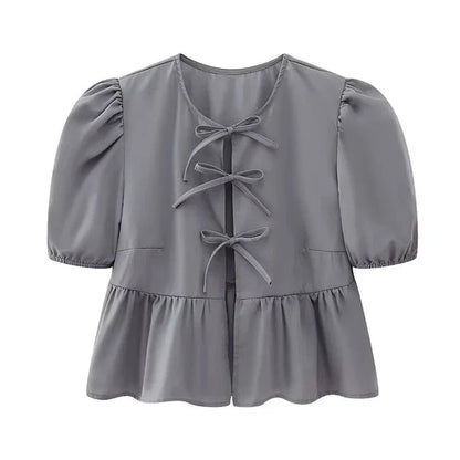 Bluse mit Leopardenmuster, Puffärmel und Schleifenakzent