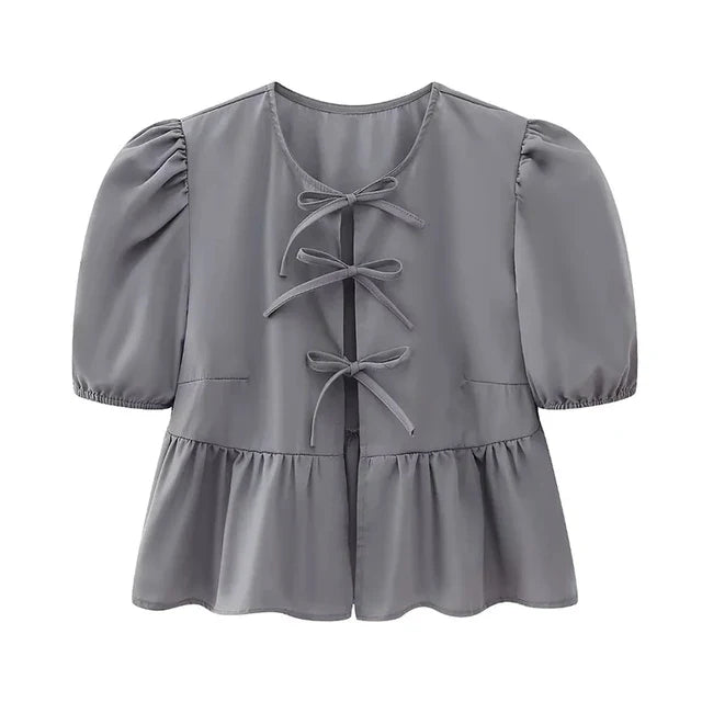 Bluse mit Leopardenmuster, Puffärmel und Schleifenakzent