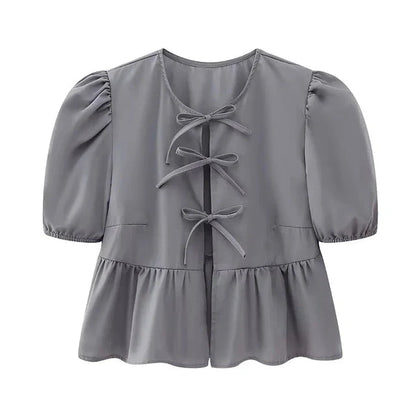 Bluse mit Leopardenmuster, Puffärmel und Schleifenakzent