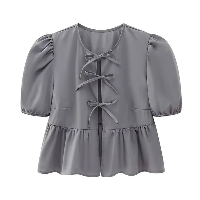 Bluse mit Leopardenmuster, Puffärmel und Schleifenakzent - Livezo