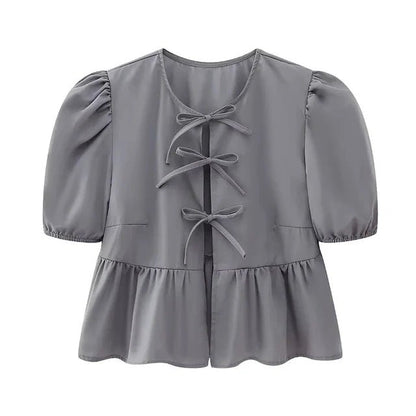 Bluse mit Leopardenmuster, Puffärmel und Schleifenakzent - Livezo