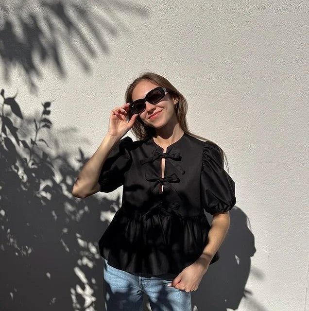 Bluse mit Leopardenmuster, Puffärmel und Schleifenakzent - Livezo