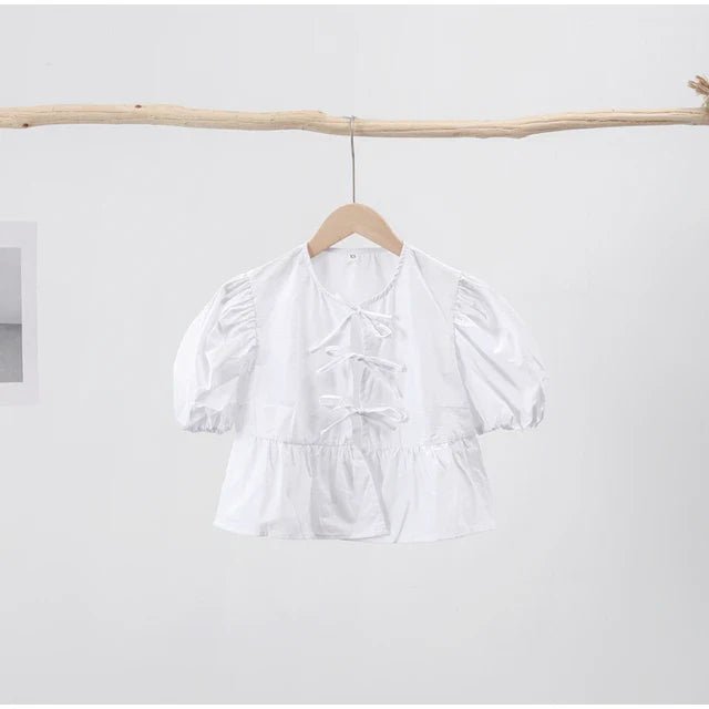 Bluse mit Leopardenmuster, Puffärmel und Schleifenakzent - Livezo