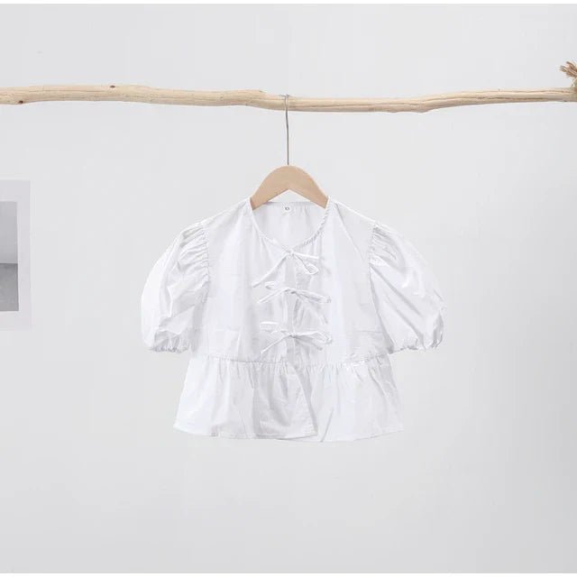 Bluse mit Leopardenmuster, Puffärmel und Schleifenakzent - Livezo