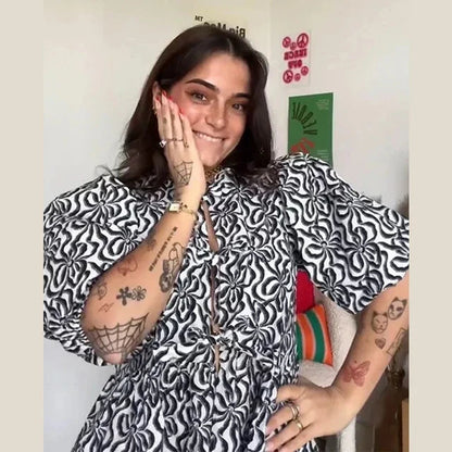 Bluse mit Leopardenmuster, Puffärmel und Schleifenakzent
