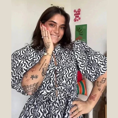 Bluse mit Leopardenmuster, Puffärmel und Schleifenakzent