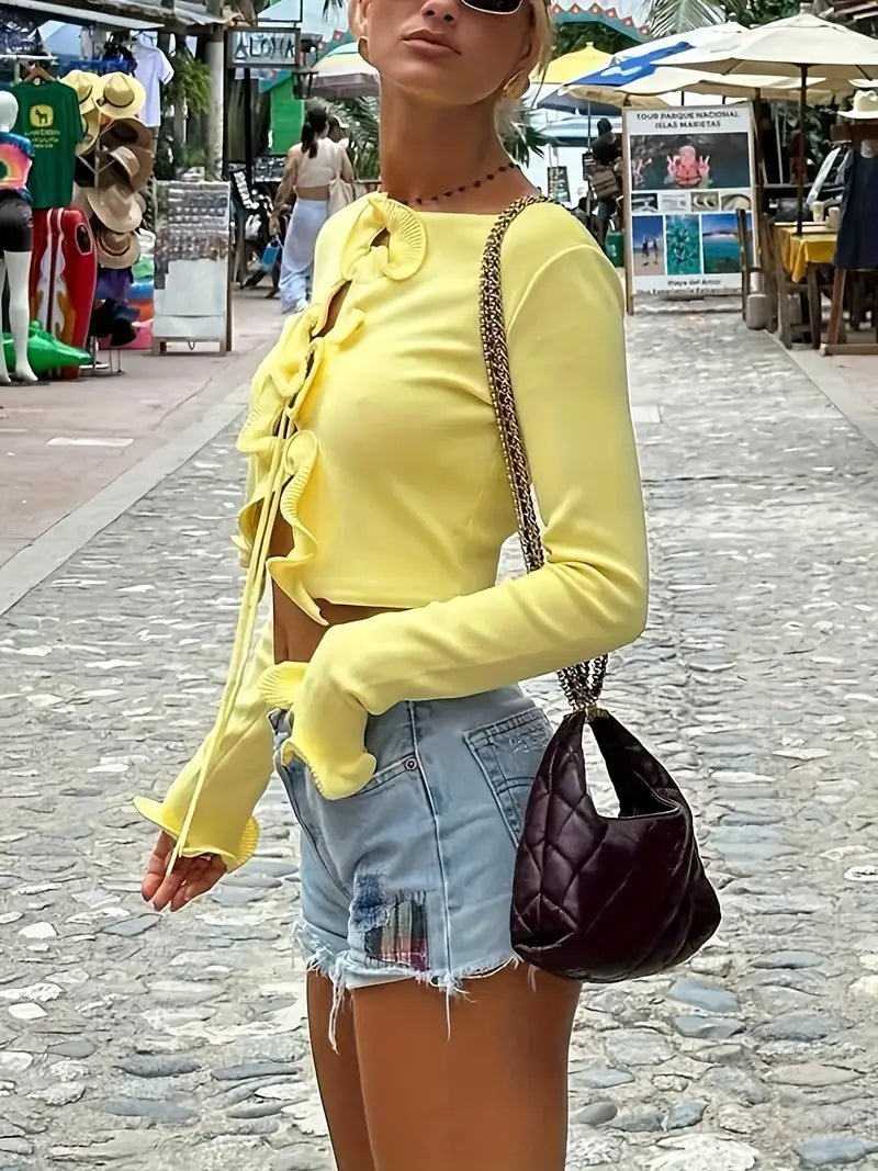 Gemütliche Strickjacke mit Rüschen und Bindeband vorne - Livezo