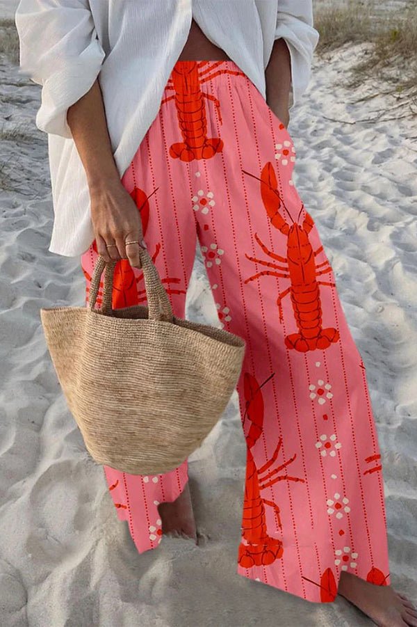 Hosen mit maritimem Print, elastischem Bund, lockerem Schnitt und Taschen - Livezo