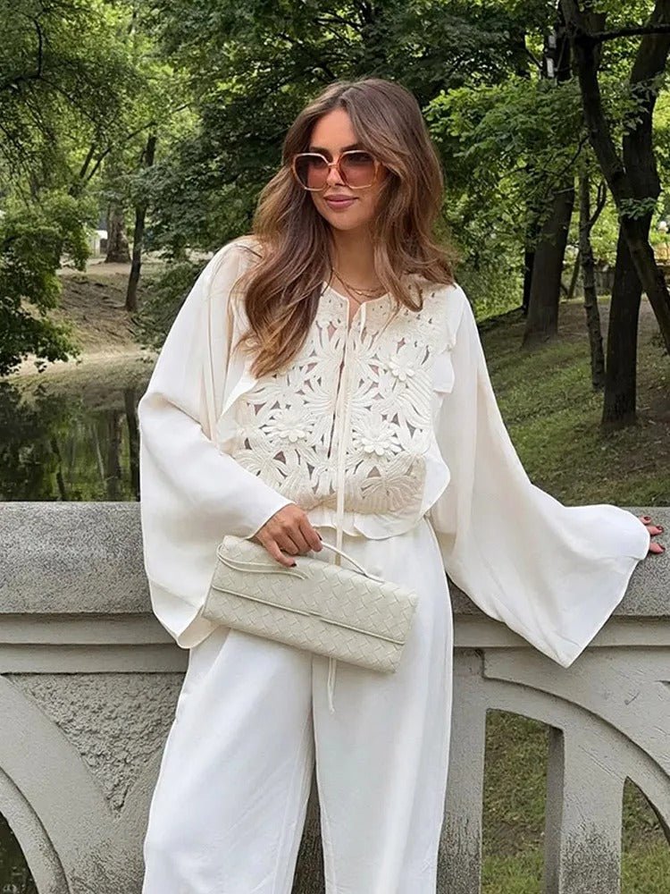 Lässiges Shirt mit Taillenschnürung, Hohlstickerei und Rundhalsausschnitt - Livezo