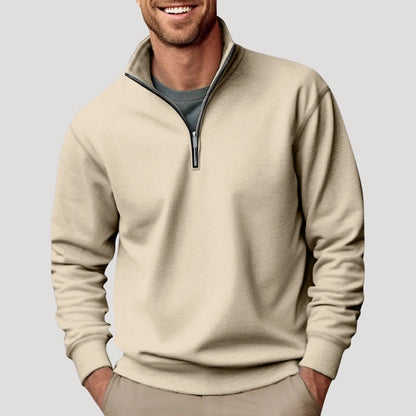 Men's quarter-zip sweater featuring a polished stand collar